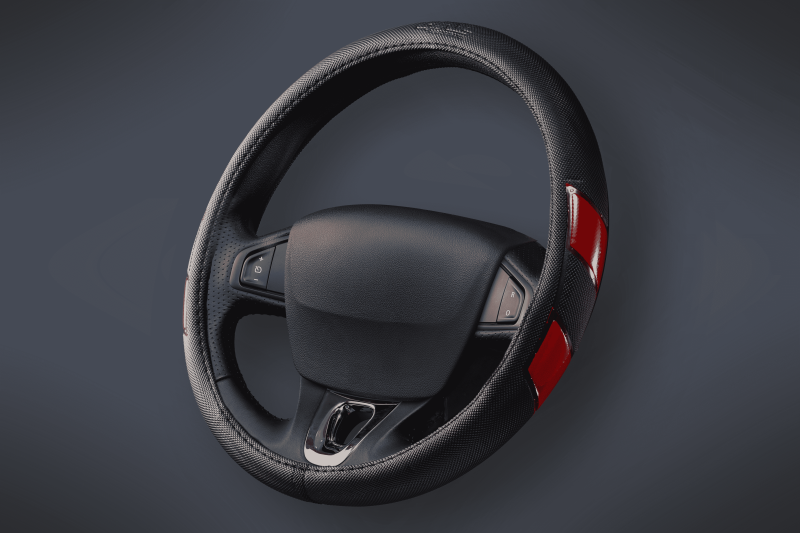 AX62 CUBRE VOLANTE AUTO SKYLINE 37-39 NEGRO-ROJO QKL